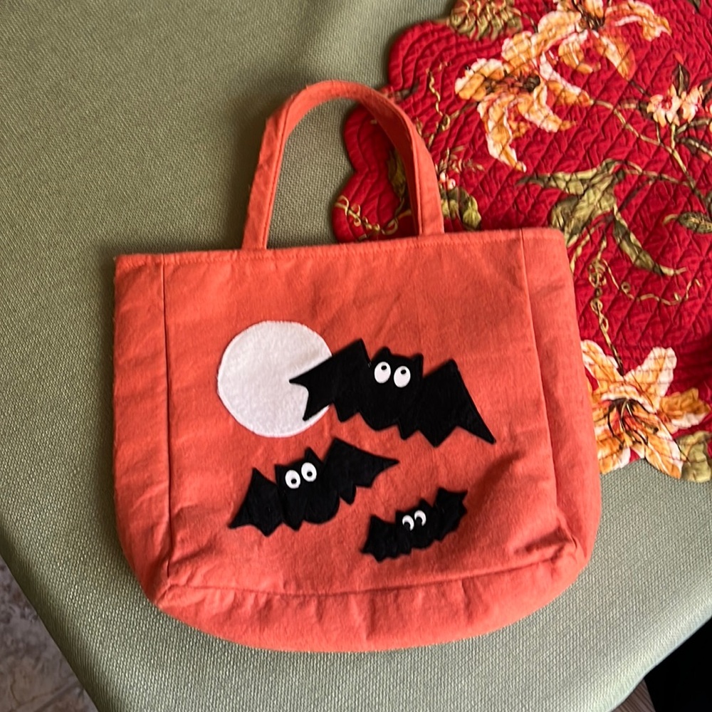 Pottery barn kids orange trick or treat bag with bats and a moon. Halloween hit!
